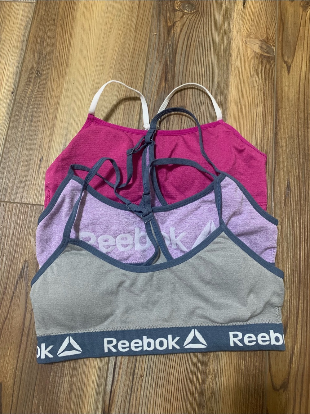 Reebok 3-Pack Seamless Bralettes in Fuchsia, Lavender & Light Gray
